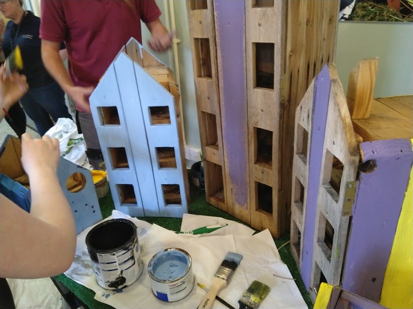 bug houses being painted